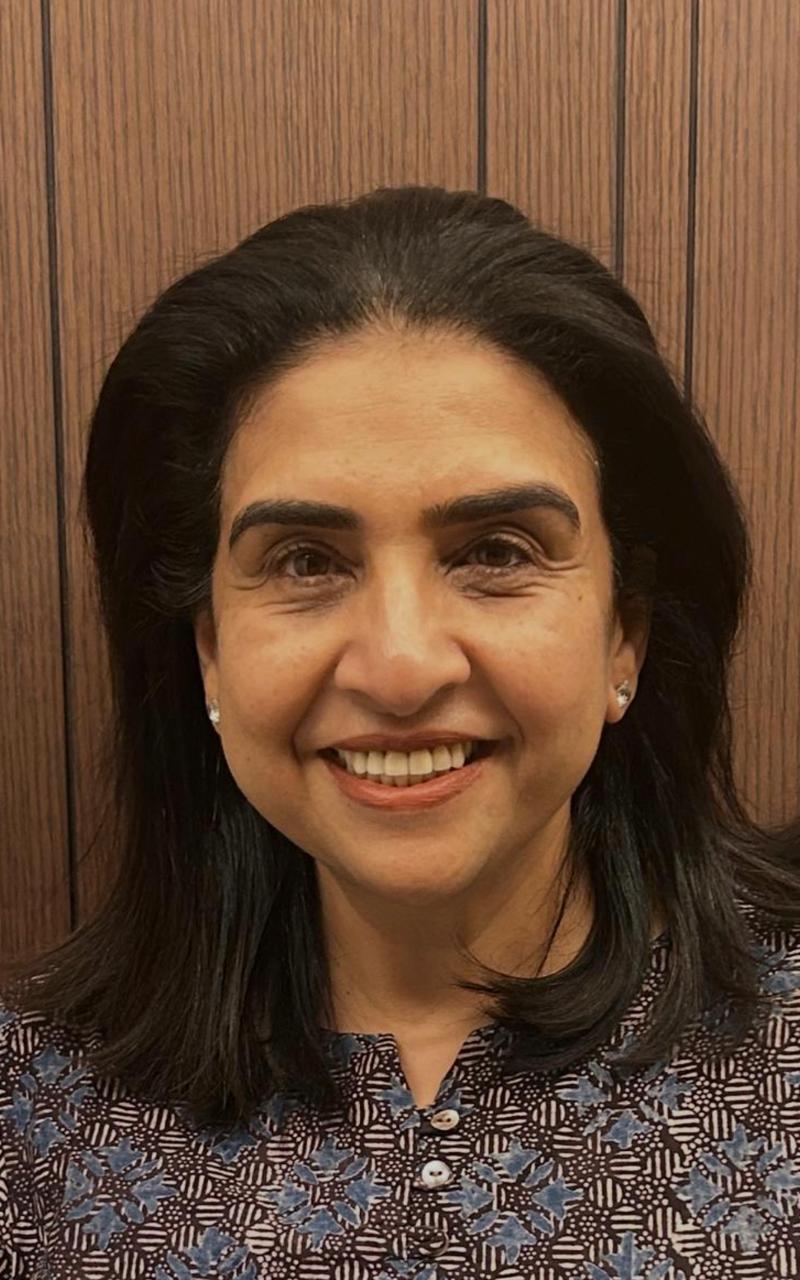 Lubna Meherally smiling in a close portrait
